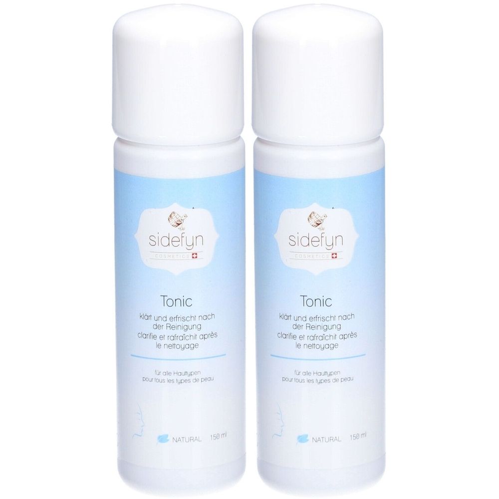 Deux flacons blancs avec étiquette bleue. L'étiquette indique "sidefyn Tonic". Texte en allemand et français.