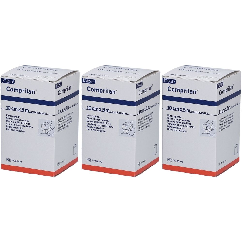 Drei weiße Kartons mit blauer Schrift. Aufschrift: Comprilan, 10 cm x 5 m. Abbildung einer Hand, die einen Verband anlegt.