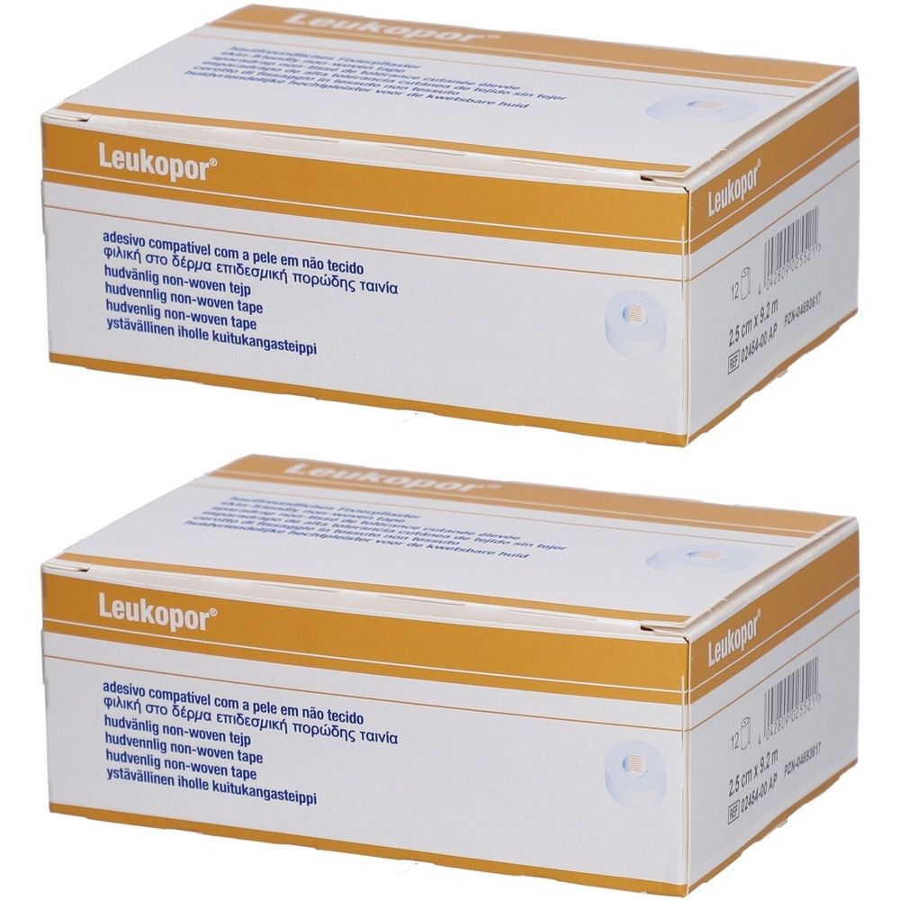 Deux boîtes de pansements Leukopor. Blanc avec bande jaune. Inscription Leukopor et informations multilingues.
