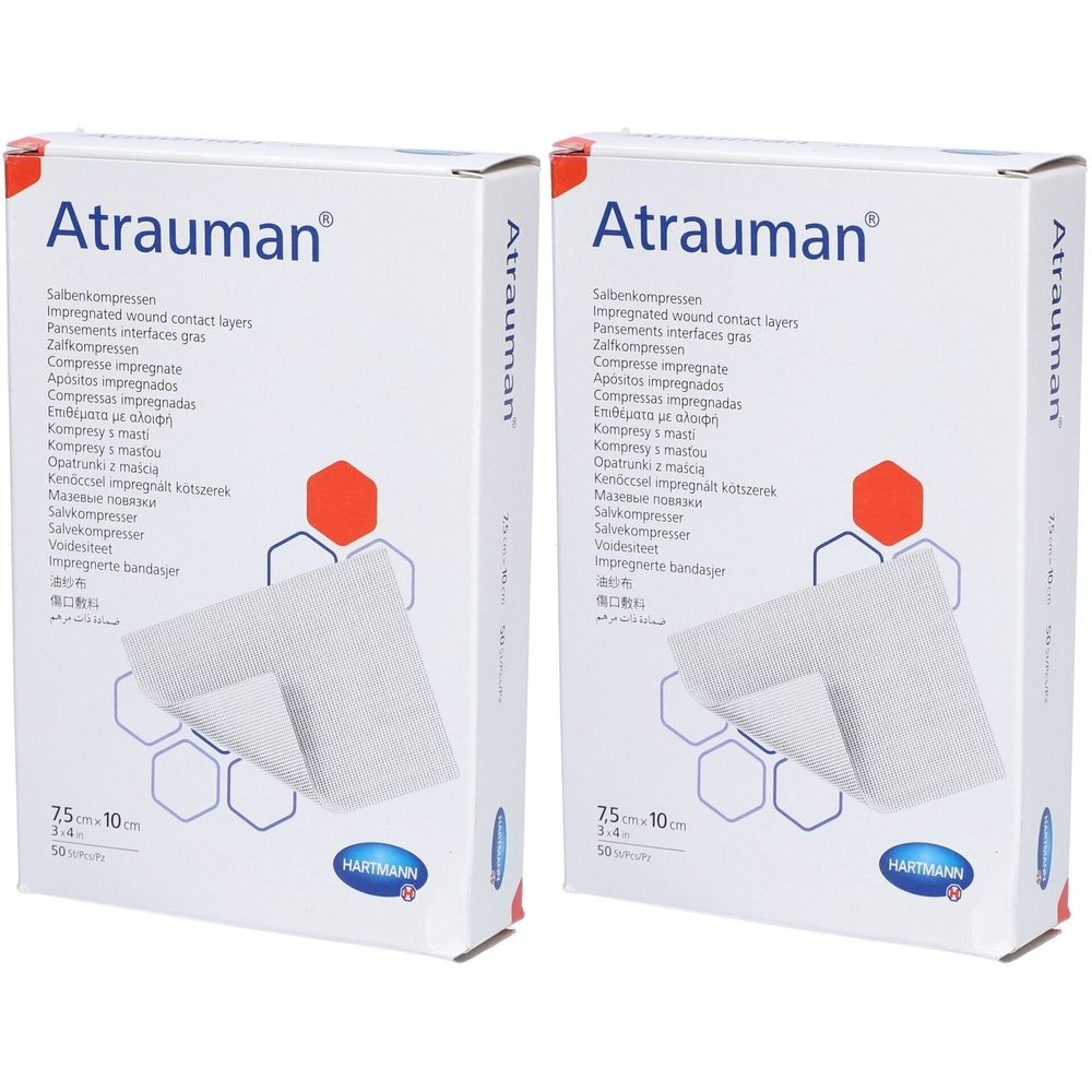 Deux boîtes de pansements Atrauman. Emballage blanc avec nom et logo du produit. Dimensions 7,5 x 10 cm.