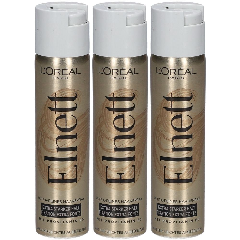 Drei Haarspray-Flaschen. Goldfarbene Dosen mit weißem Deckel. Aufschrift: L'Oréal Paris, Elnett. Extra starker Halt, mit Vitamin B5.