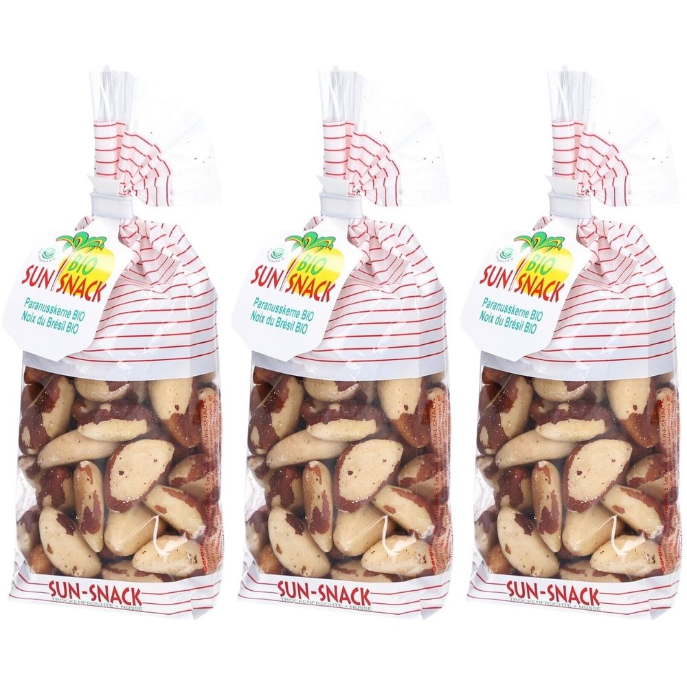 Drei transparente Beutel mit Paranusskernen. Auf jedem Beutel steht SUN-SNACK. Etikett mit BIO-Logo und Text.