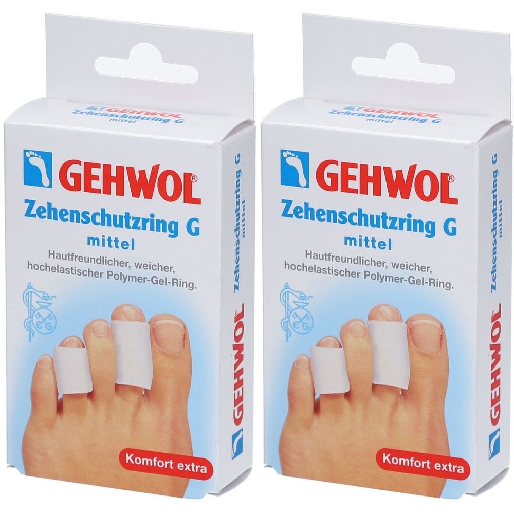 Zwei Packungen GEHWOL Zehenschutzring G. Weiße Ringe auf Zehen, in Kartons. Aufdrucke: GEHWOL, mittel, Komfort extra.