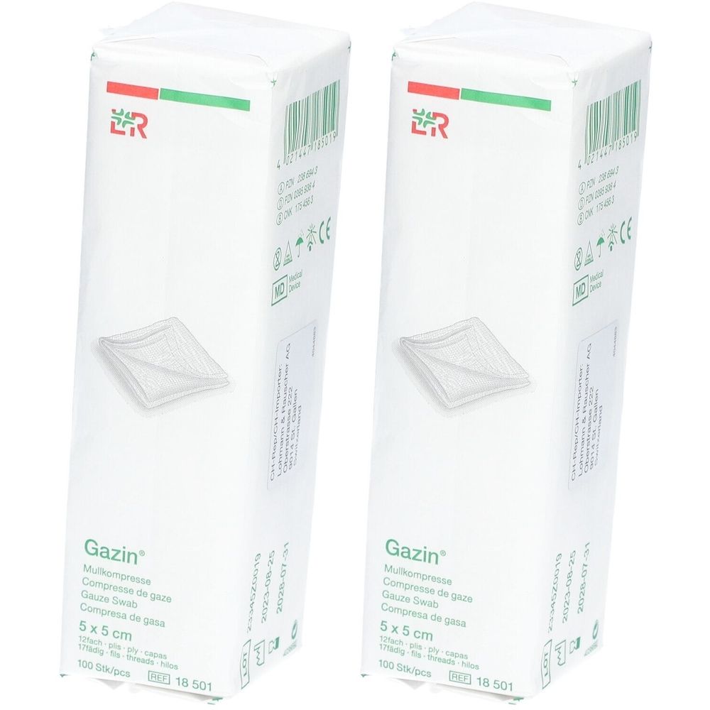 Zwei weiße Kartons mit Gazin Mullkompressen. Aufdruck: Gazin, 5x5 cm. Grün-rotes Logo. 100 Stück.