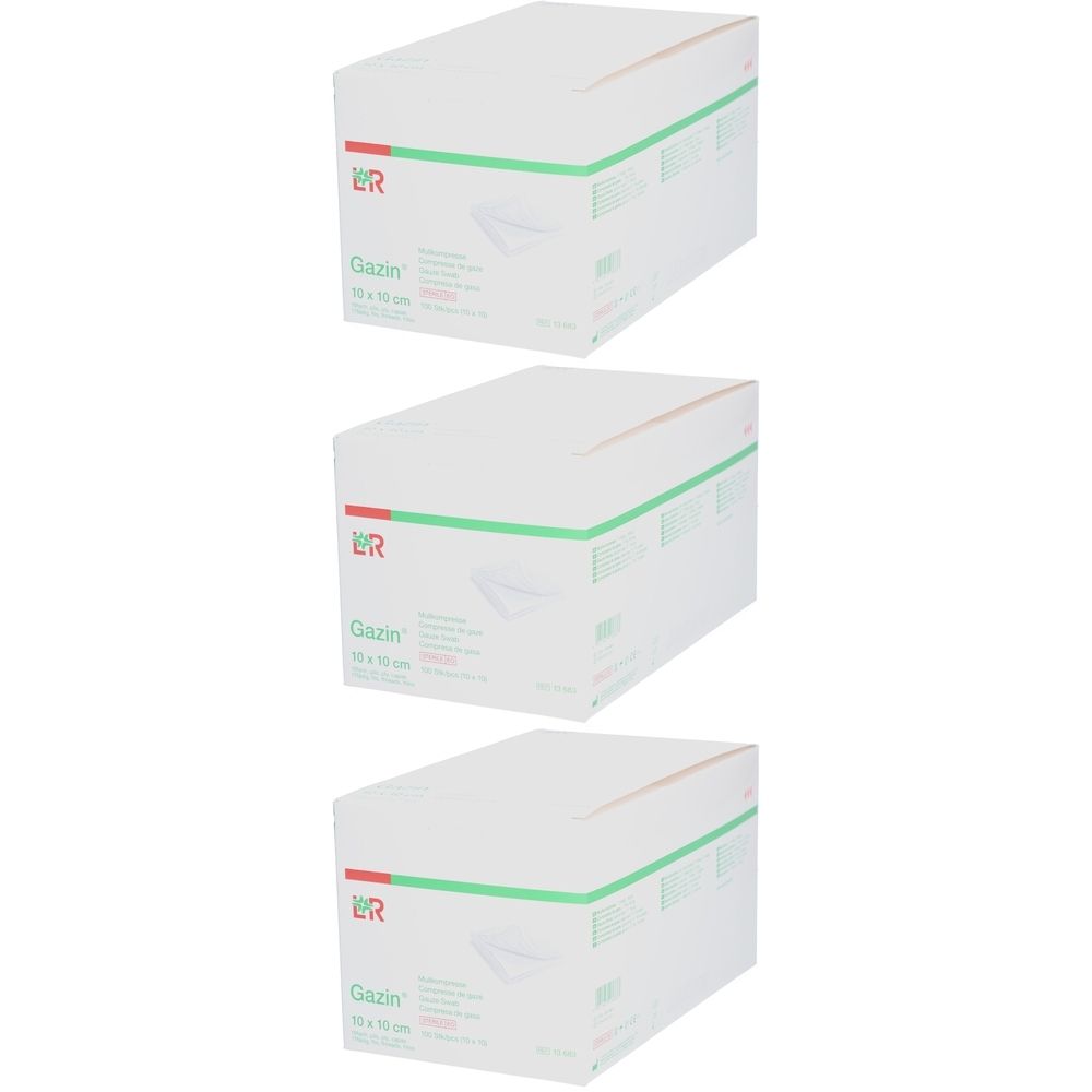 Drei Kartons GAZIN Mullkompressen. Weiß, mit grünen und roten Akzenten. Aufschrift: GAZIN 10 x 10 cm.