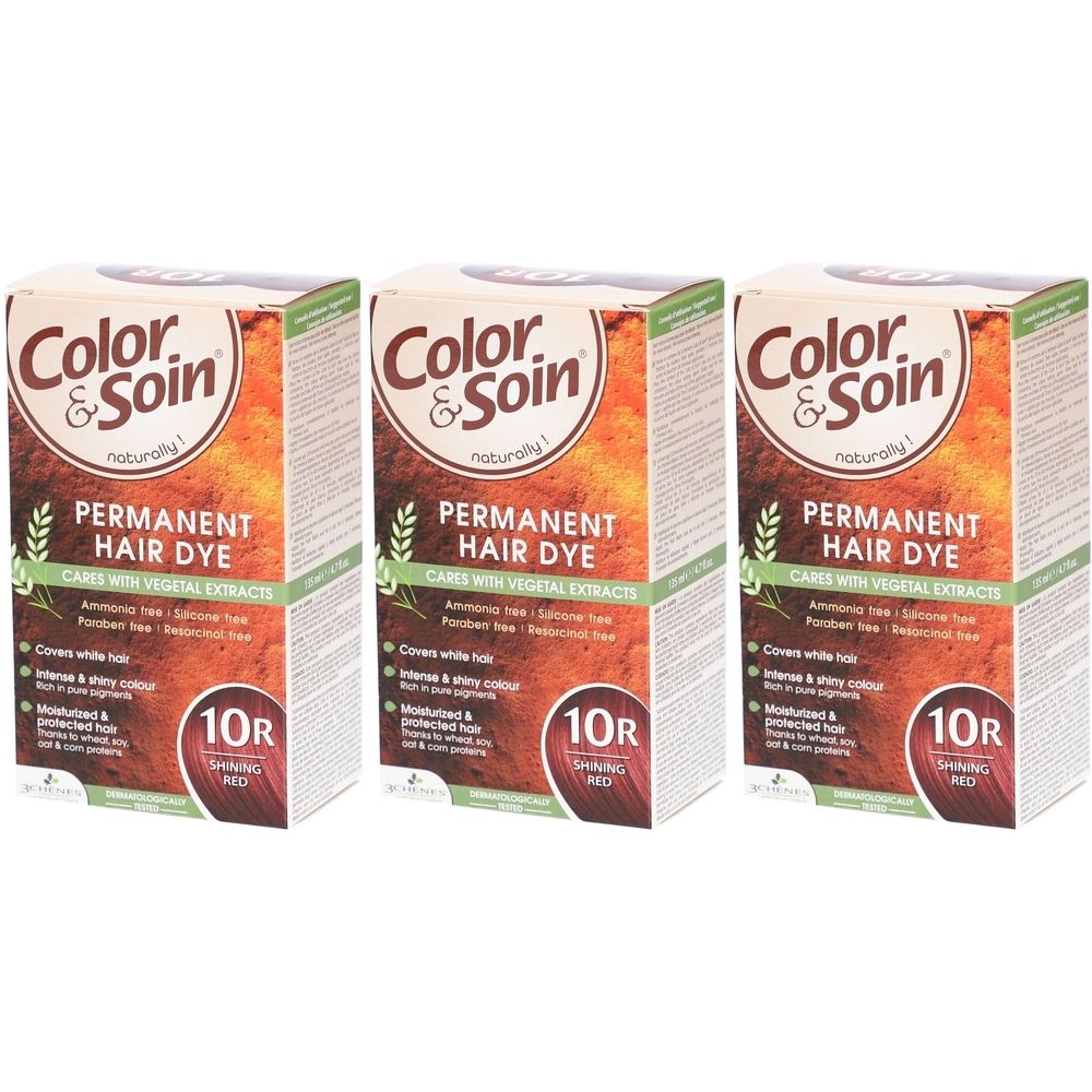 Drei Packungen Haarfarbe. Aufschrift: Color & Soin, Permanent Hair Dye, 10R Flammendes Rot. Enthält pflanzliche Extrakte.