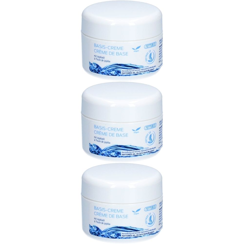 Trois pots blancs avec couvercles. Inscription: BASIS-CREME, CREME DE BASE. Étiquette avec logo et texte. Huile de jojoba.