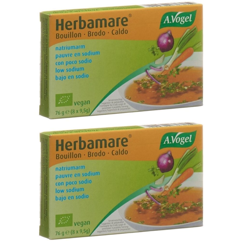 Zwei grüne und orangefarbene Kartons mit "Herbamare"-Schriftzug. Text in mehreren Sprachen. A. Vogel Logo. Vegan-Siegel. Abbildung von Suppe.