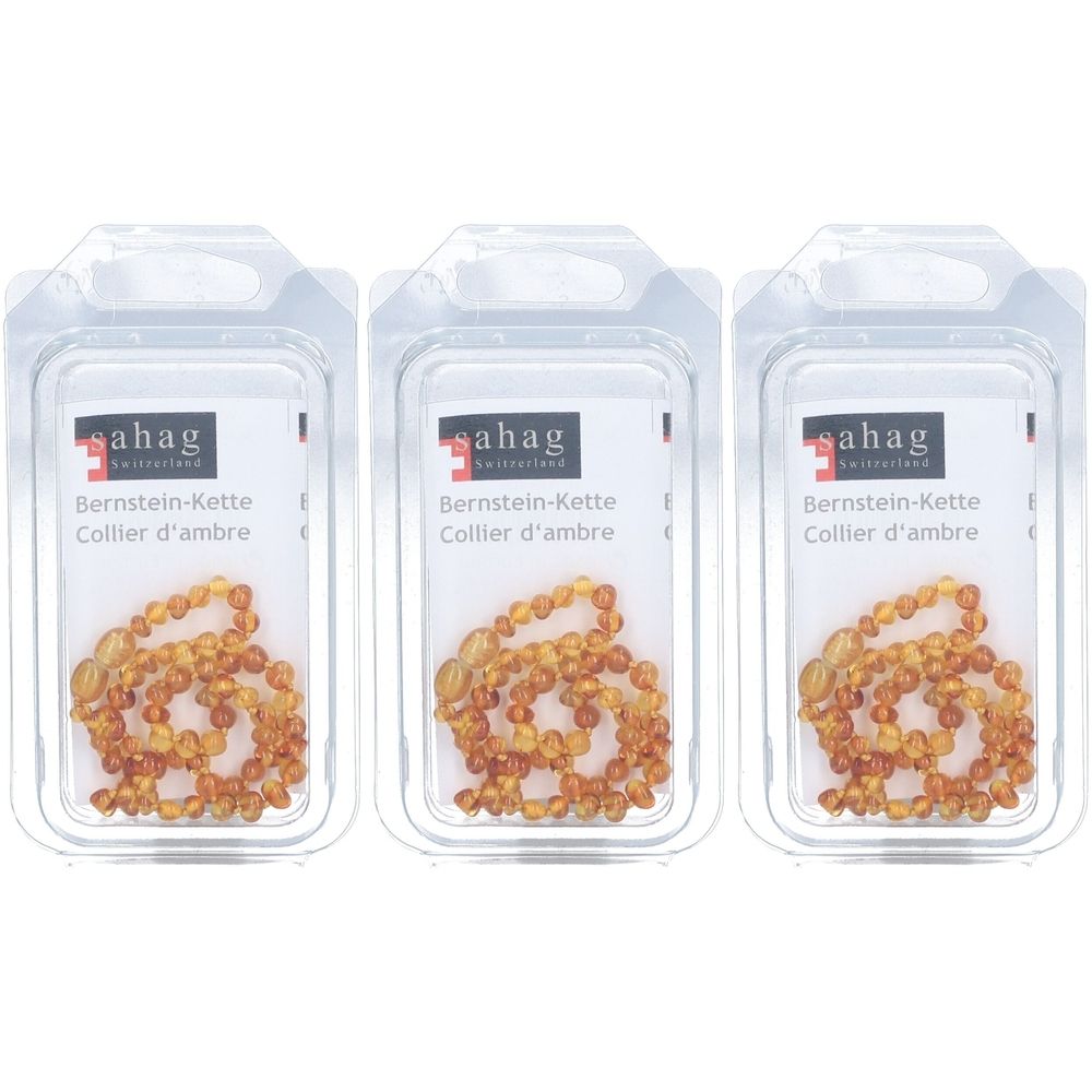 Trois colliers en ambre dans des blisters transparents. Chaque emballage montre un collier de perles ambrées. Impression : sahag, Collier d'ambre.