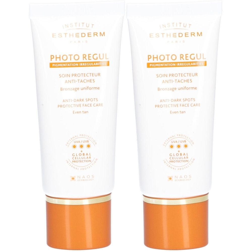 Zwei Tuben Esthederm Photo Regul Gesichtscreme. Weiß mit orangefarbenen Akzenten. Text: Photo Regul, Anti-Taches, Even tan.