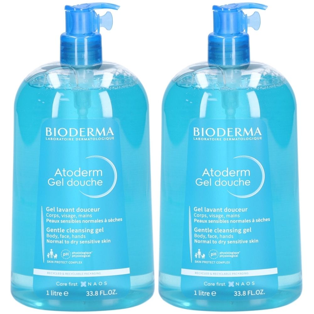 Deux flacons bleus de gel douche Bioderma Atoderm. Chaque flacon a une pompe bleue et du texte blanc. Inscription : Gel douche, 1 litre.