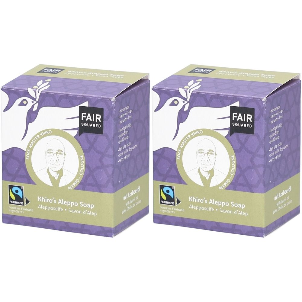 Zwei quadratische Kartons mit FAIR SQUARED-Logo und Produktnamen. Aufdrucke: Khiro's Aleppo Soap, Fairtrade-Siegel, Abbildung eines Mannes.