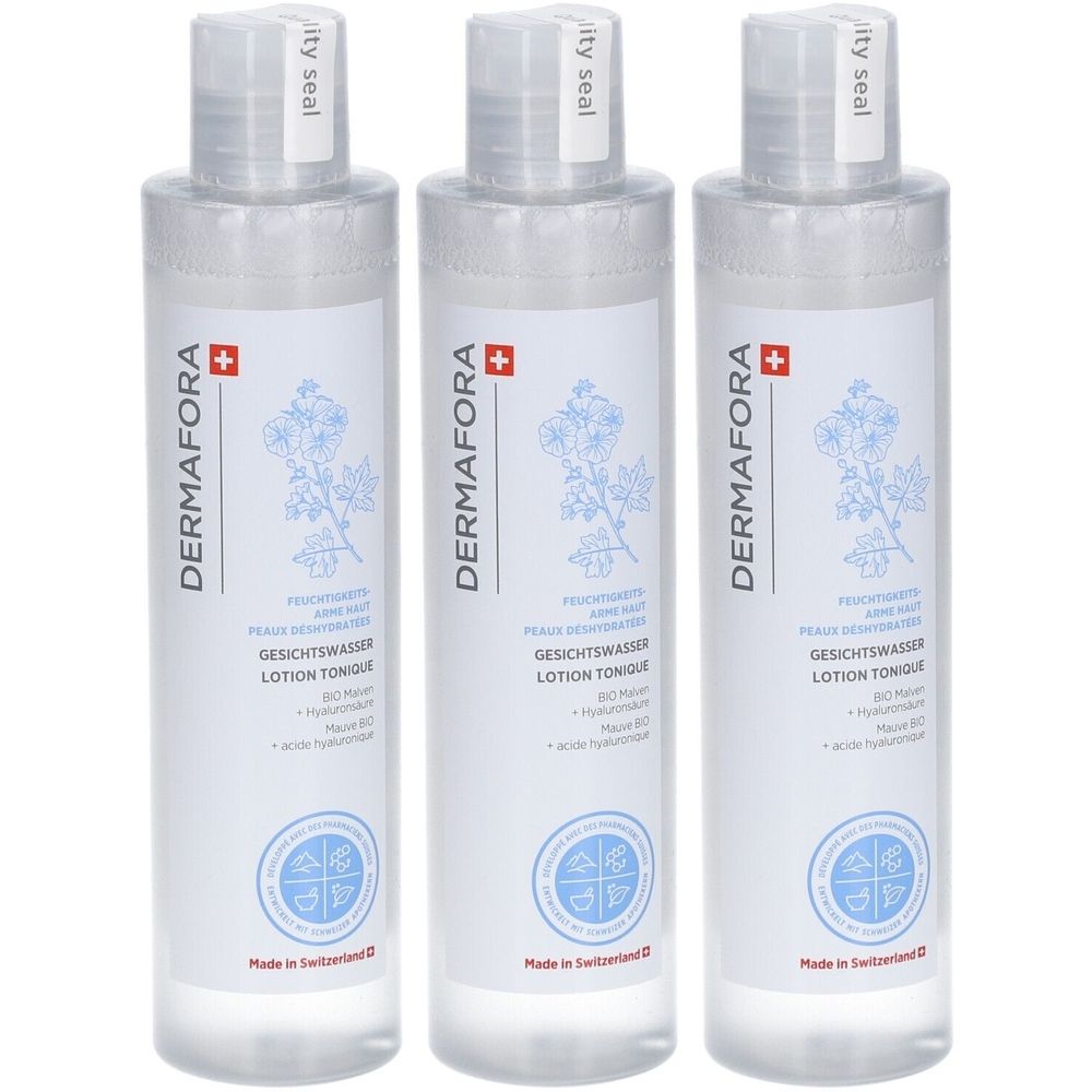 Trois flacons de lotion tonique. Inscription : Dermafora, Lotion Tonique. Croix suisse. Flacons transparents avec bouchon blanc.