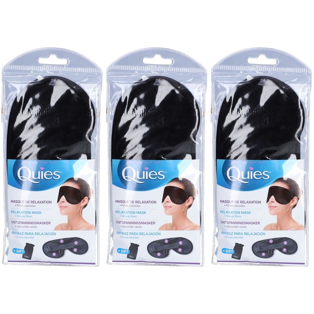 Trois masques de relaxation noirs emballés. Inscription: Quies, masque de relaxation, masque pour les yeux avec 2 coussinets.