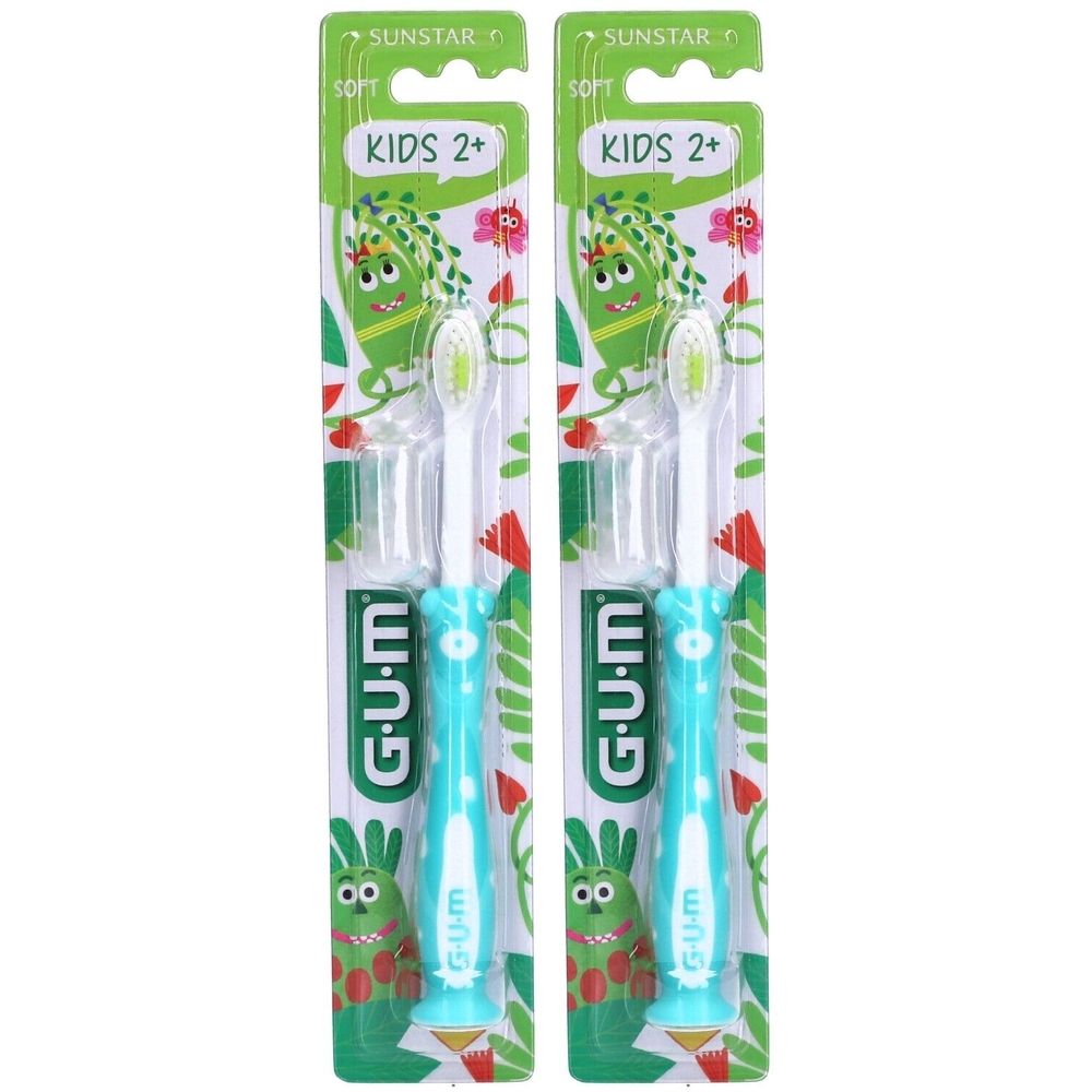Deux brosses à dents GUM Kids, turquoise avec poils blancs, en emballage. Inscription : KIDS 2+, GUM.