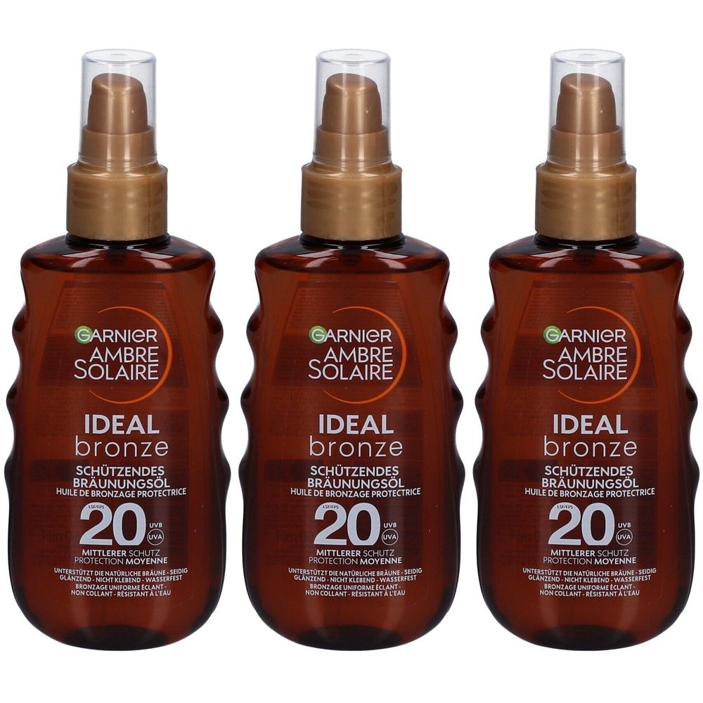 Trois flacons bruns avec vaporisateur. Inscription "GARNIER AMBRE SOLAIRE IDEAL bronze" et "20" sur chacun.