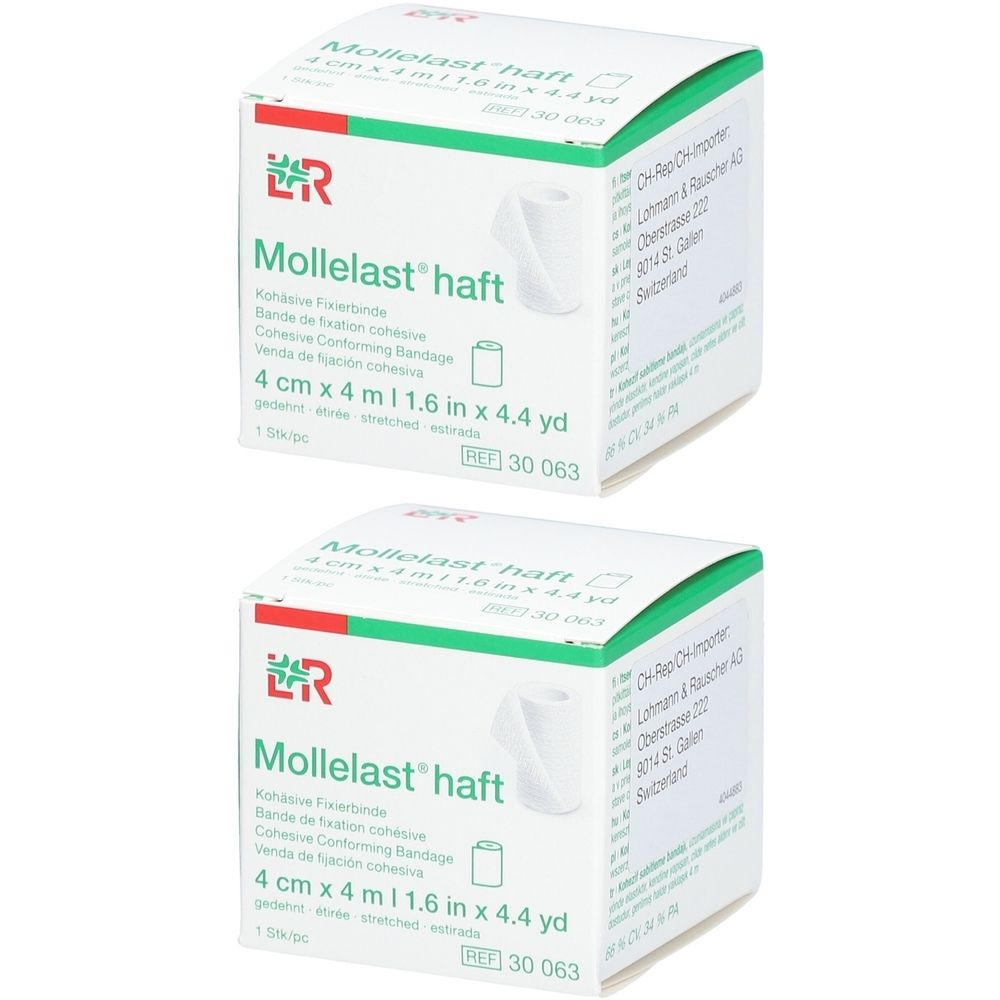 Zwei Kartons mit weißer Fixierbinde. Aufdruck: Mollelast haft, 4 cm x 4 m. Grün-weiße Verpackung.