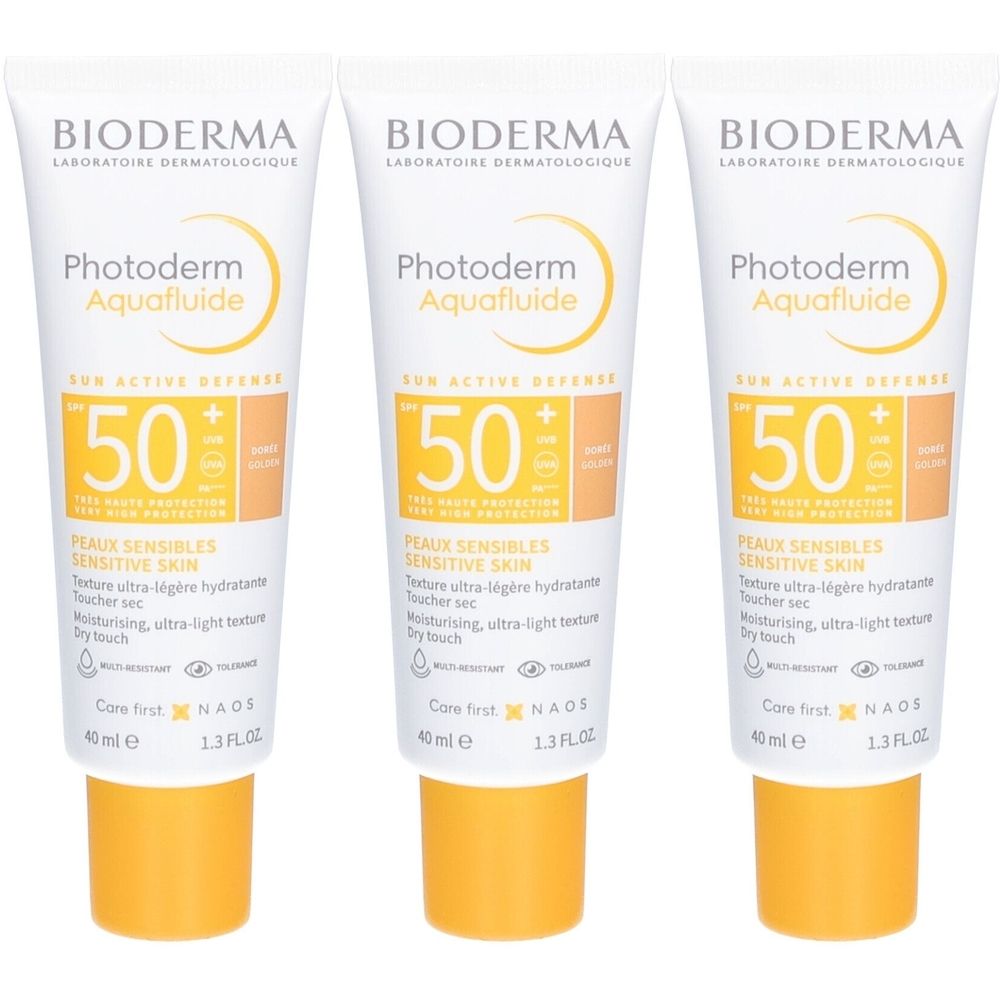Drei Tuben Bioderma Photoderm Aquafluide SPF50+ mit gelbem Verschluss. Aufschrift: Aquafluide, SPF 50, für empfindliche Haut.