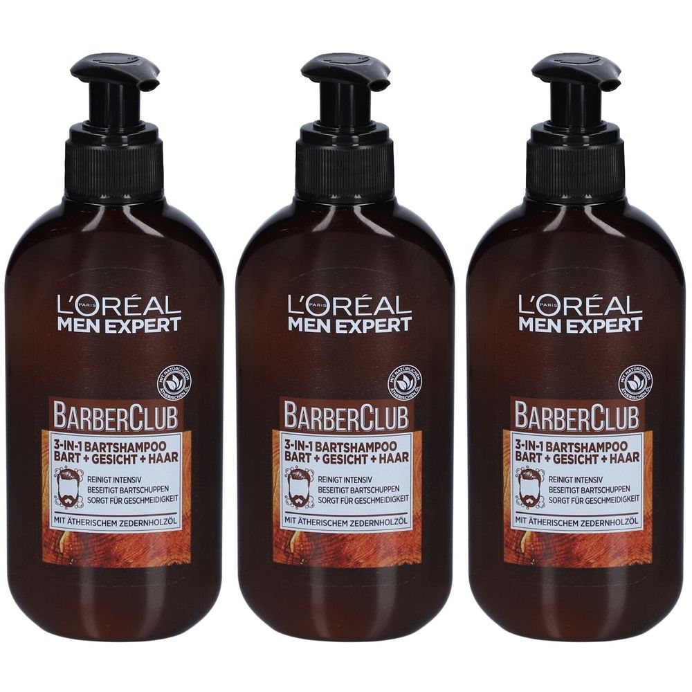 Drei Flaschen L'Oréal Men Expert Barber Club Bartshampoo. Braune Flaschen mit schwarzem Pumpkopf. Aufschrift: 3-in-1 Bart + Gesicht + Haar.