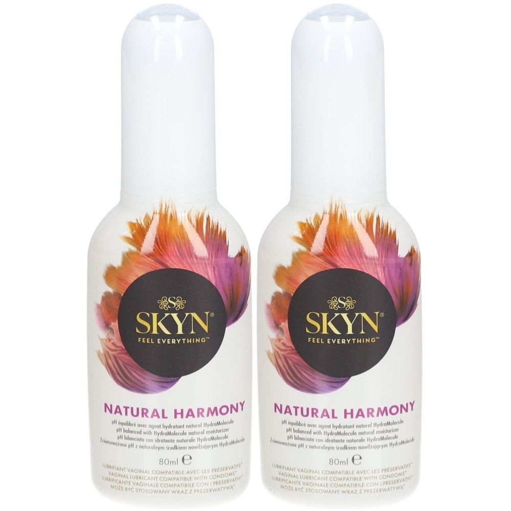 Zwei Flaschen mit weißem Deckel. Aufschrift SKYN, Natural Harmony. 80ml.