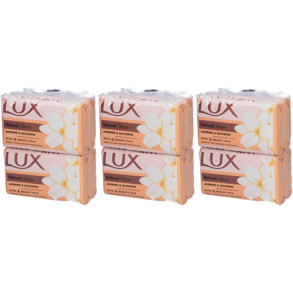 Mehrere Seifenstücke, verpackt. Aufschrift: LUX Velvet Glow Jasmin & Glycerin. Mit Beauty Milk. Rosa und orangefarbene Verpackung.