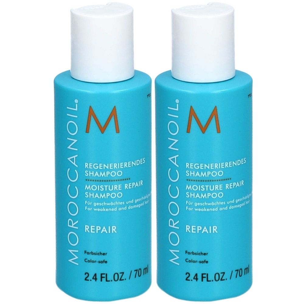 Zwei blaue Shampoo-Flaschen mit weißen Deckeln. Aufschrift: Moroccanoil, Regenerierendes Shampoo, Moisture Repair Shampoo, 2.4 FL.OZ./70ml.