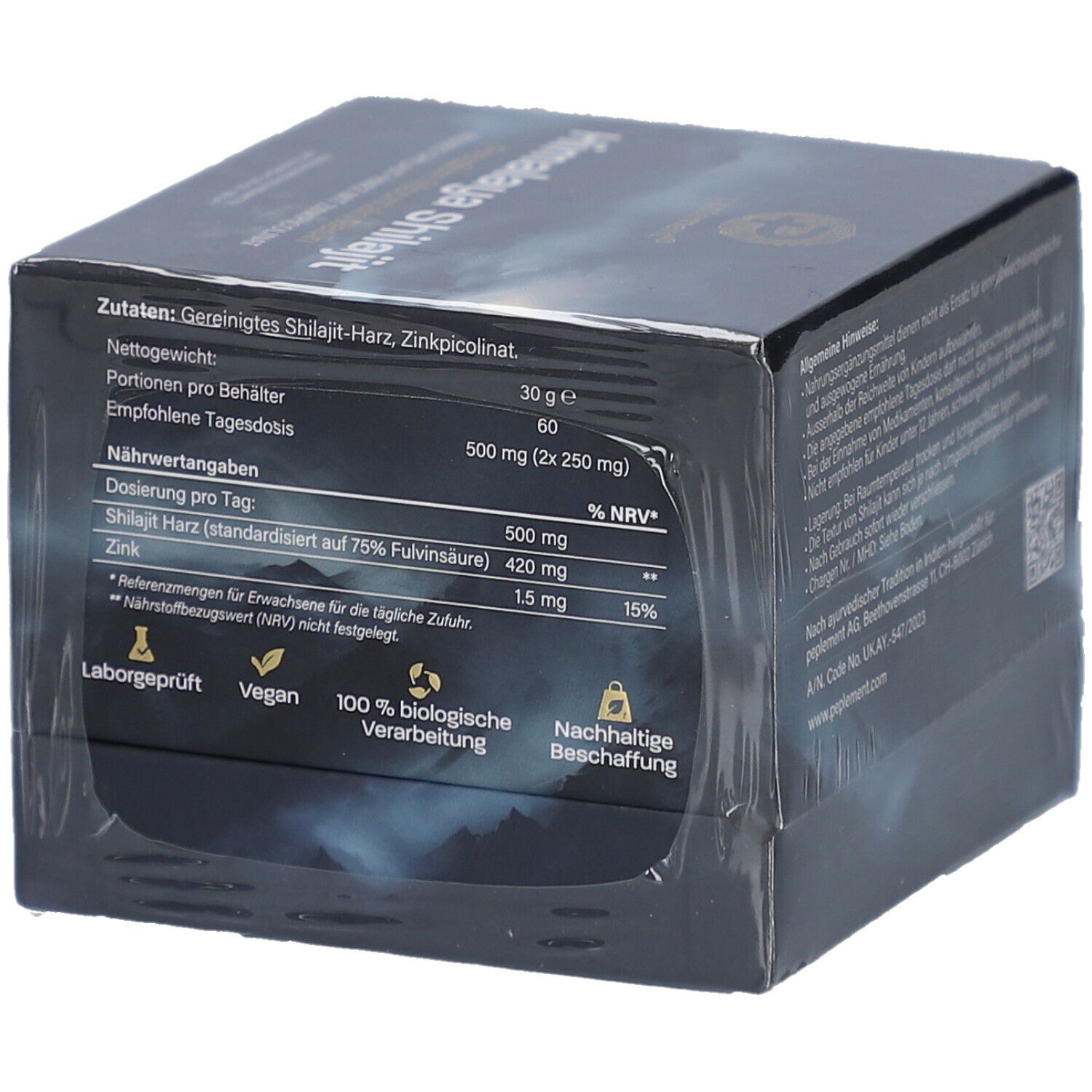 Schachtel mit Zutaten und Nährwertangaben. Text in Deutsch. Laborgeprüft, vegan, nachhaltig. Verpackt.