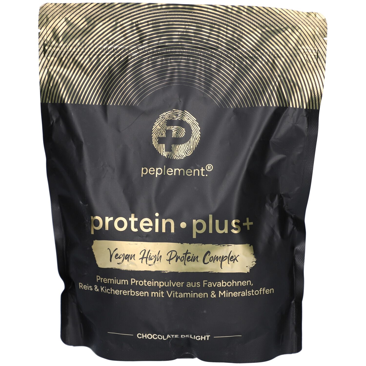 Schwarze Tüte mit goldfarbenem Muster. Aufschrift: protein plus+, Vegan High Protein Complex. Logo: P. Aufdruck: Chocolate Delight.