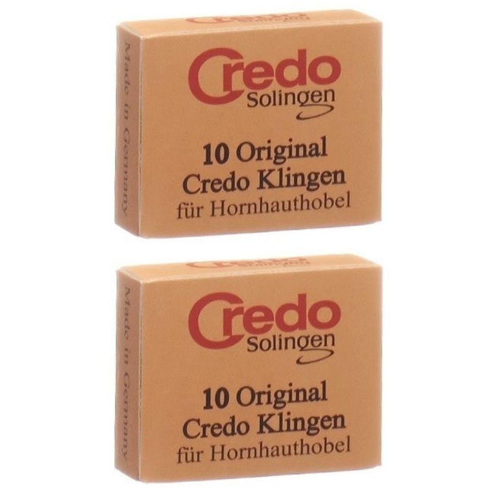 Zwei rechteckige Pappschachteln. Aufschrift: Credo Solingen, 10 Original Credo Klingen für Hornhauthobel. Made in Germany.