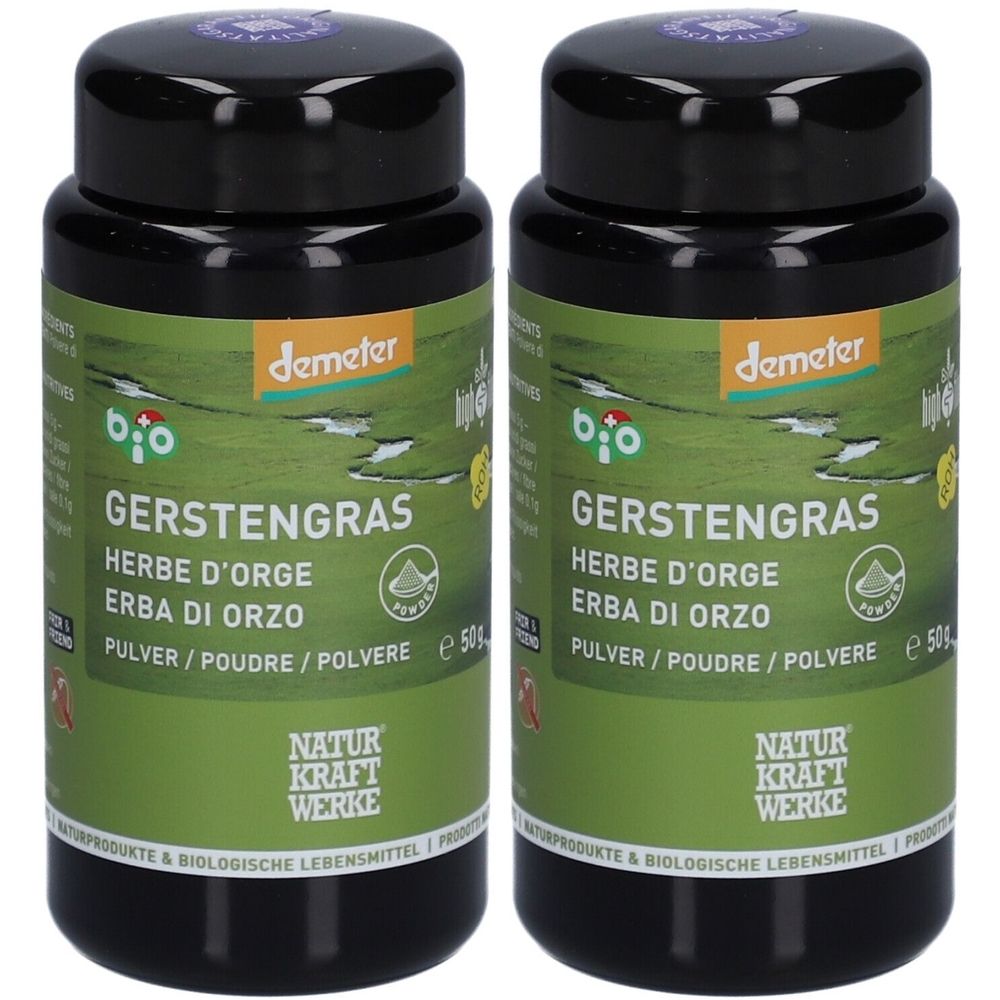 Zwei schwarze Dosen mit grünem Etikett. Aufschrift: Gerstengras, Demeter-Logo, Bio-Siegel. Pulver. Natur Kraft Werke.