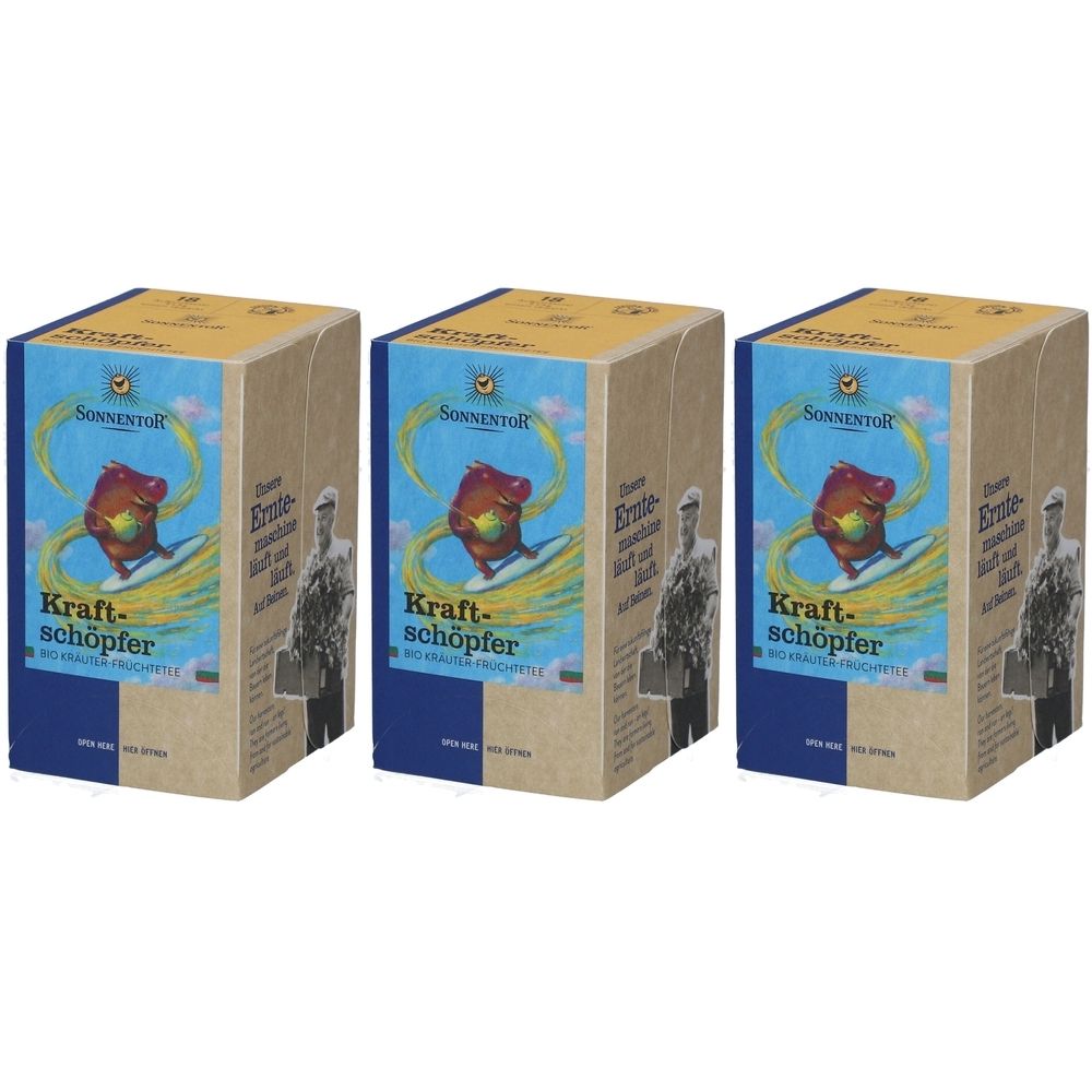 Drei Kartons SONNENTOR® Kraftschöpfer Tee. Aufdruck: Logo, Illustration, Schriftzug "Kraftschöpfer". Verpackung aus Karton mit blauen und gelben Elementen.