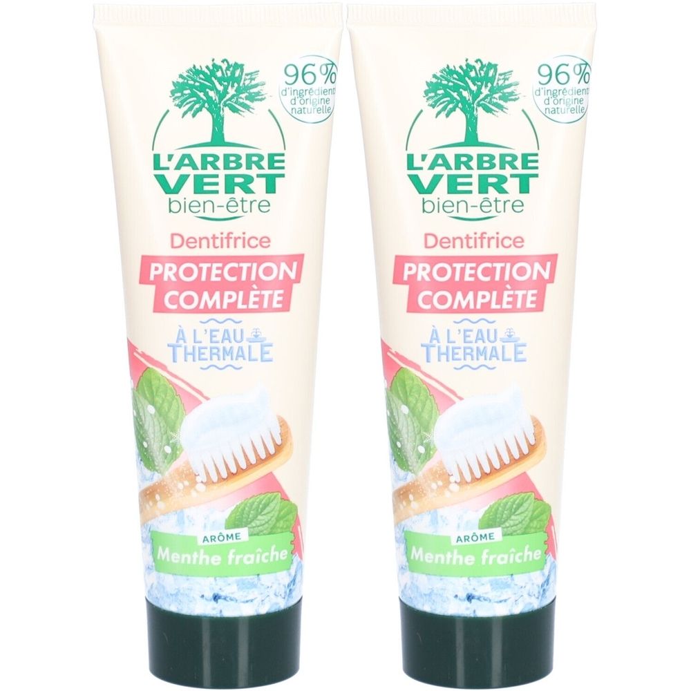 Deux tubes de dentifrice L'ARBRE VERT. Inscription: PROTECTION COMPLETE, Menthe fraîche. 96% d'ingrédients d'origine naturelle.