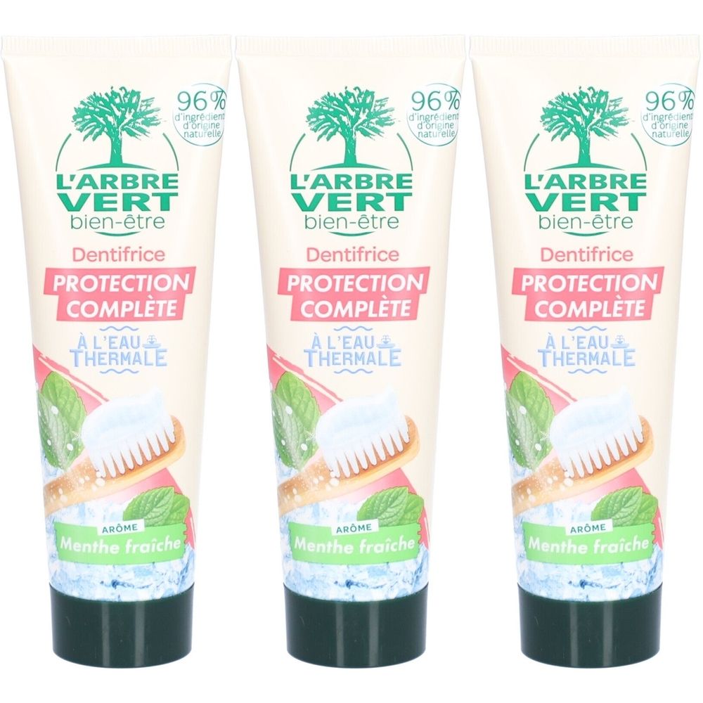 Drei Tuben Zahnpasta. Aufschrift: L'ARBRE VERT, Dentifrice, PROTECTION COMPLETE, A L'EAU THERMALE. Abbildung von Zahnbürste und Minze.