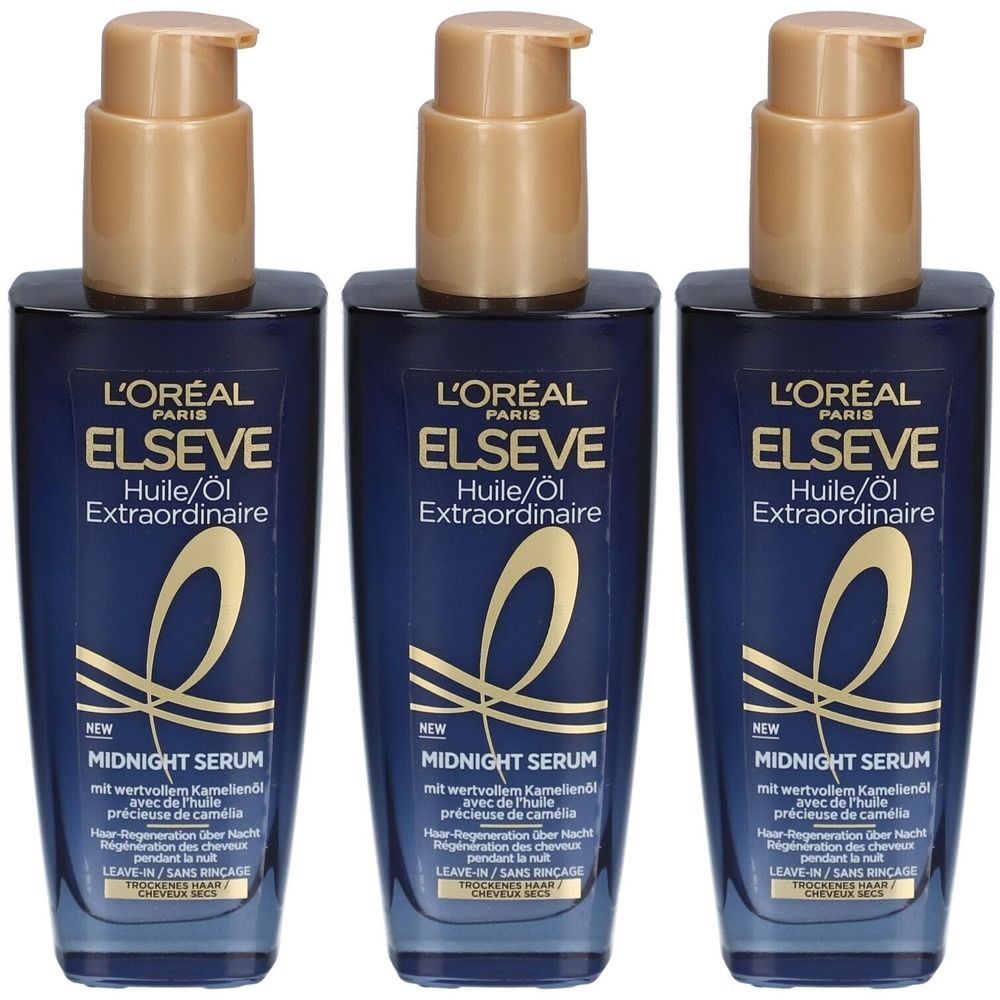Trois flacons de L'Oréal Paris Elseve Huile Extraordinaire Midnight Serum. Flacons bleus avec pompes dorées. Inscriptions du produit visibles.