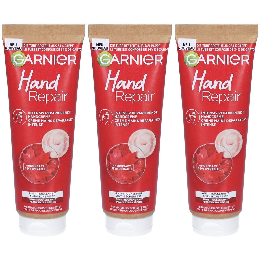 Drei Tuben Handcreme. Rote Tuben mit weißem Deckel. Aufschrift: Garnier Hand Repair. Text in Deutsch und Französisch.