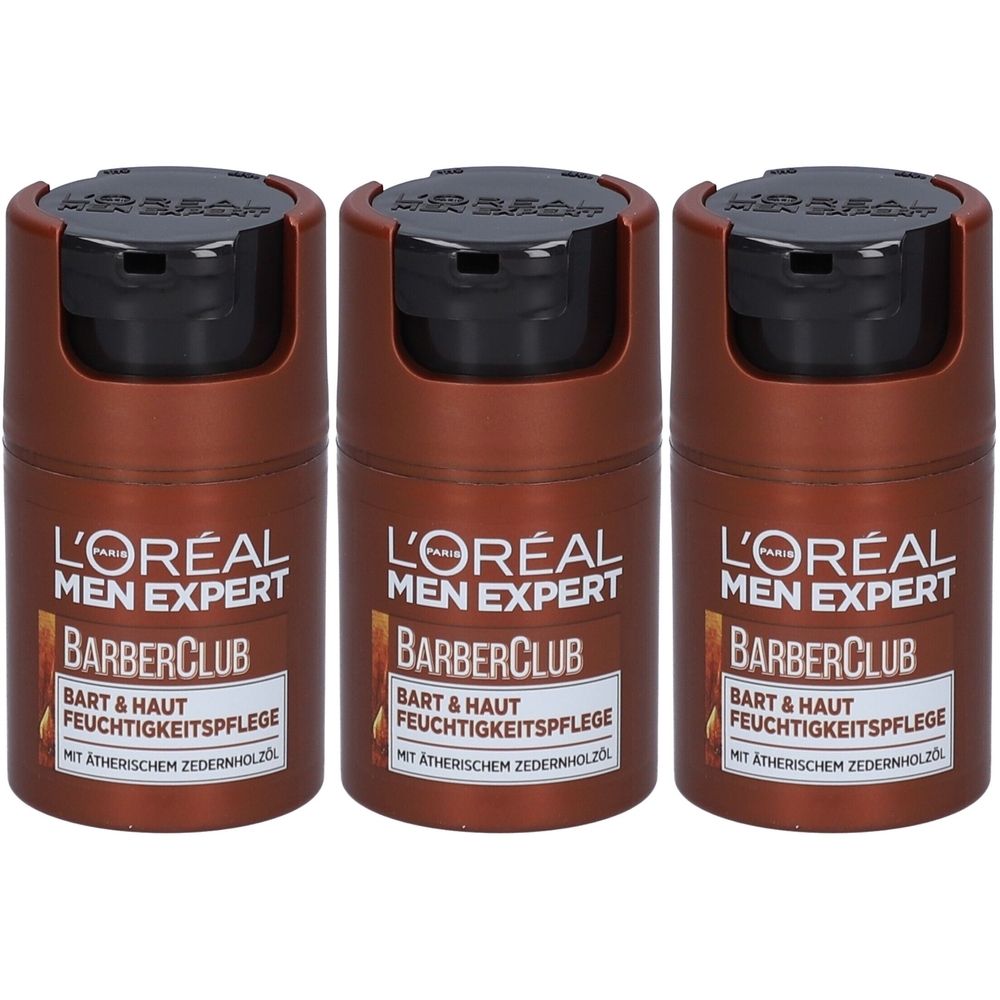 Trois flacons cylindriques marron et noirs. Inscription: L'Oréal Men Expert BarberClub, soin hydratant barbe et peau.
