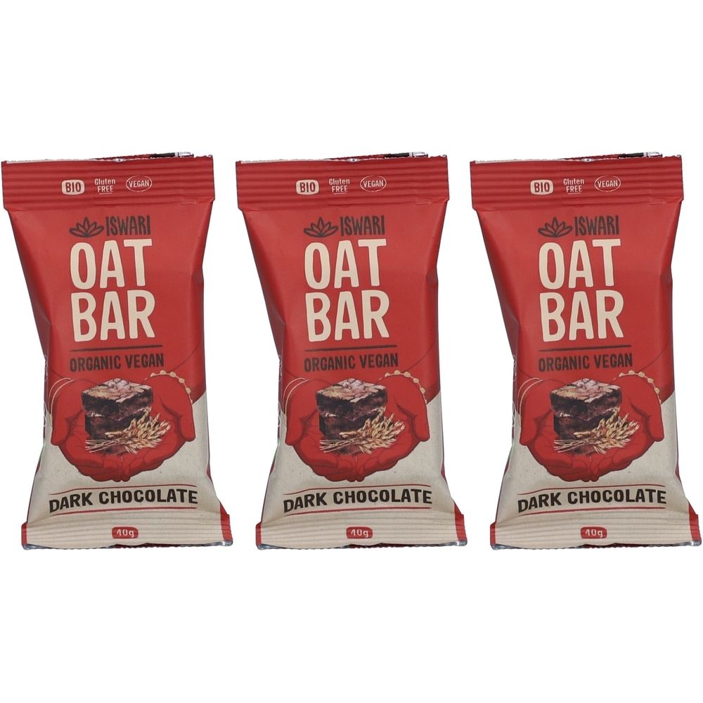 Trois barres emballées. Emballage rouge avec texte blanc : OAT BAR, DARK CHOCOLATE. Label bio et marque ISWARI visibles.