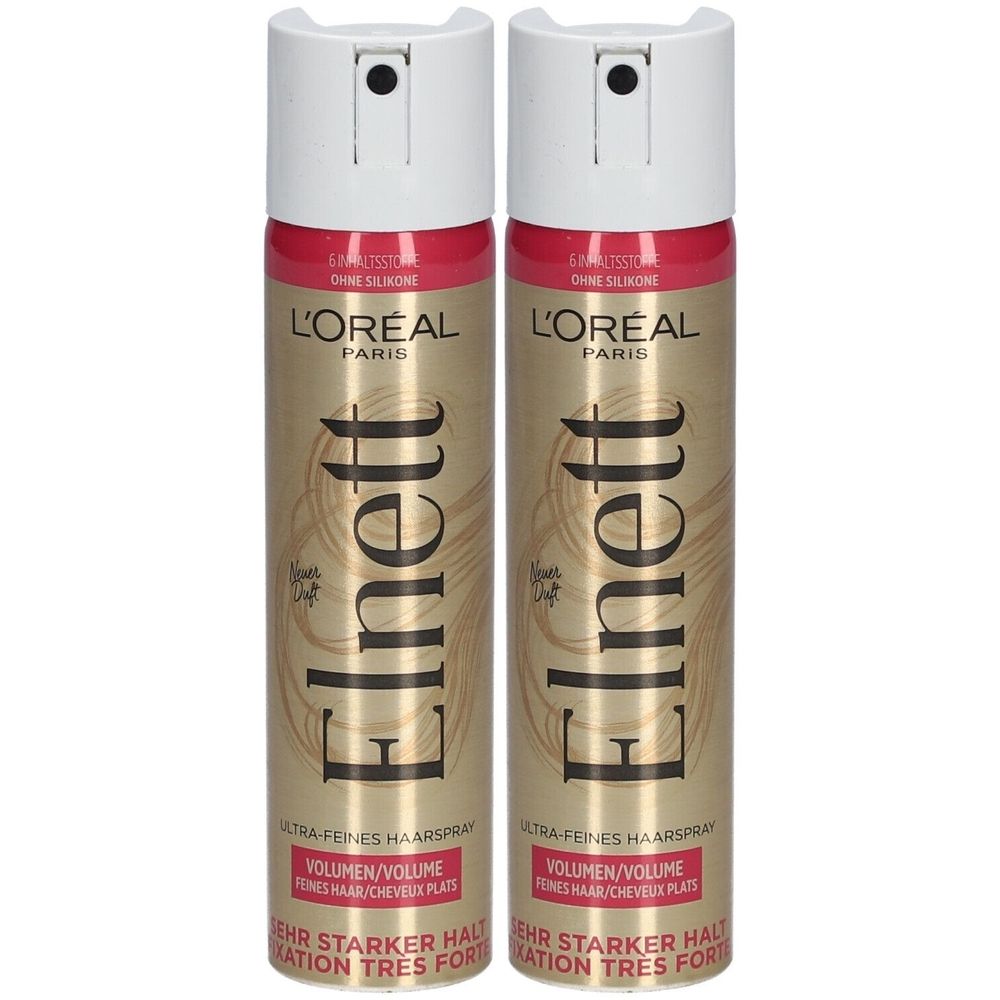 Zwei Haarspray-Dosen. Goldfarbene Dosen mit weißem Sprühkopf. Aufschrift: L'Oréal Paris Elnett, Volumen für flaches Haar, sehr starker Halt.