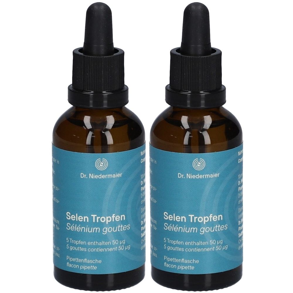 Deux flacons en verre brun avec pipettes noires. Les étiquettes indiquent "Selen Tropfen" et "Dr. Niedermaier".