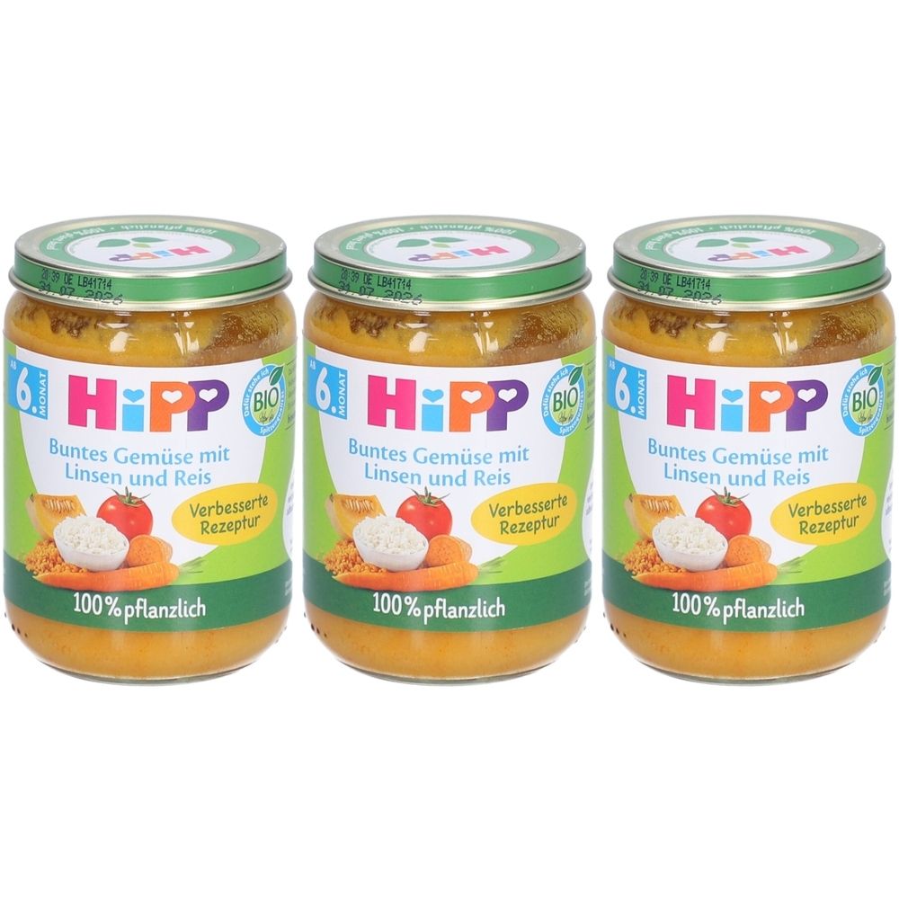 Drei Gläser HiPP Bio-Gemüse mit Linsen und Reis. Grüne Deckel, Etiketten mit Produktbildern und Text. 100% pflanzlich.