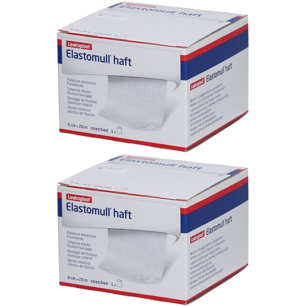 Zwei Kartons Elastomull haft. Aufdruck: 6 cm x 20 m. Weißes Verbandsmaterial wird aus der Verpackung gezogen.