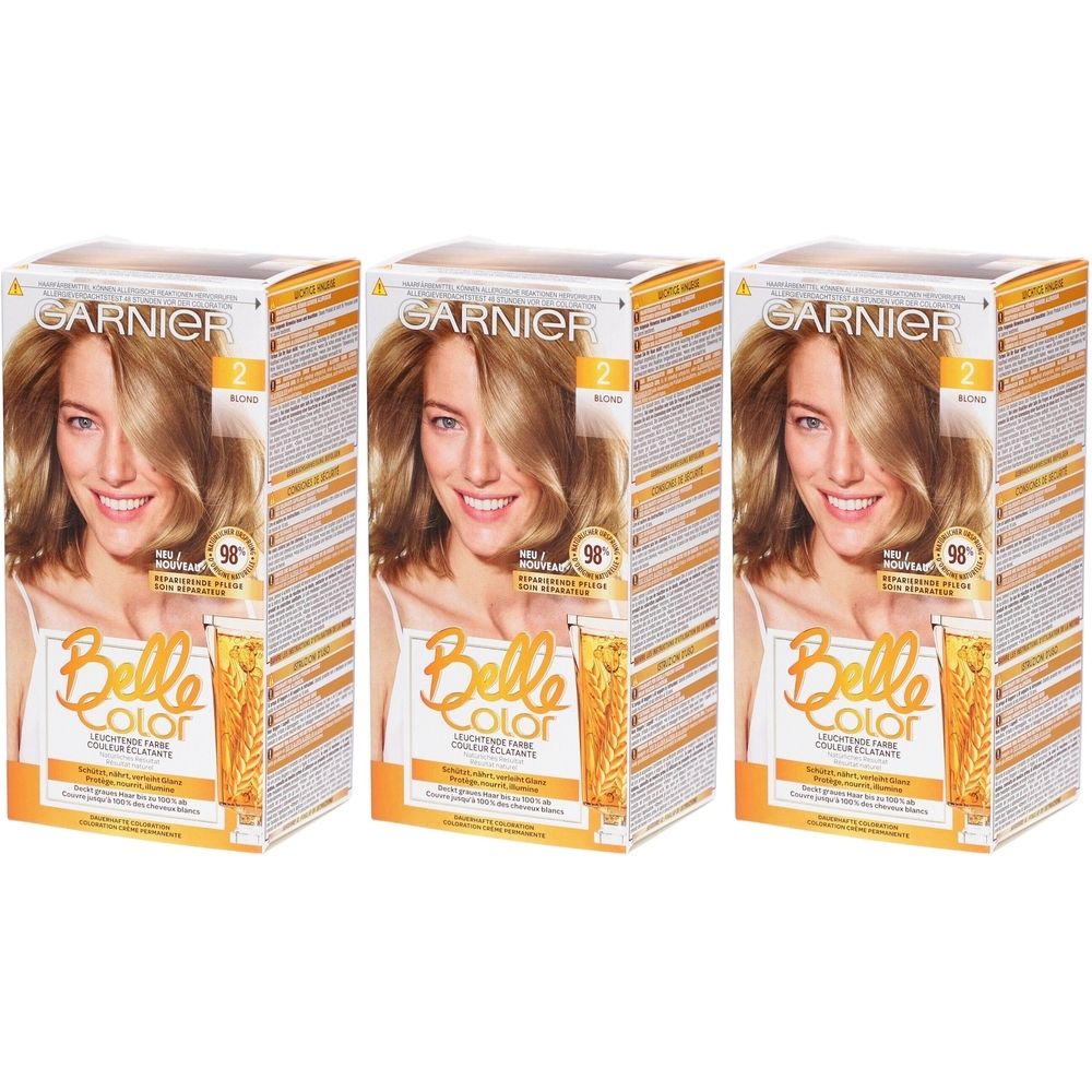 Trois boîtes de Garnier Belle Color, teinte 2 Blond. Inscription : Belle Color, Garnier, Blond, 98% ingrédients naturels.