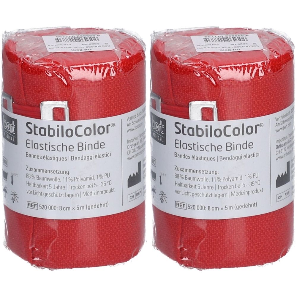 Zwei rote Bindenrollen in Folie verpackt. Aufschrift: StabiloColor, Elastische Binde. Größe: 8 cm x 5 m.