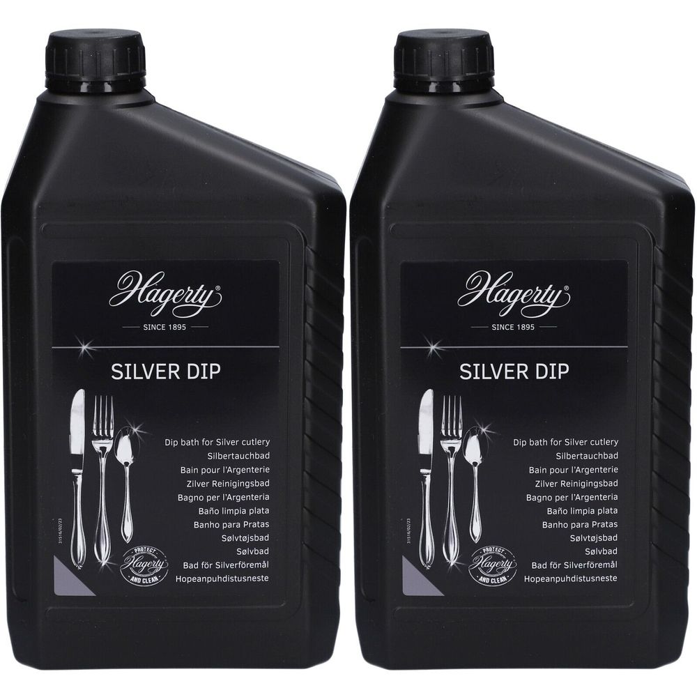 Deux flacons noirs de Hagerty Silver Dip. Inscription : SILVER DIP, bain pour couverts en argent. Logo et texte Hagerty.