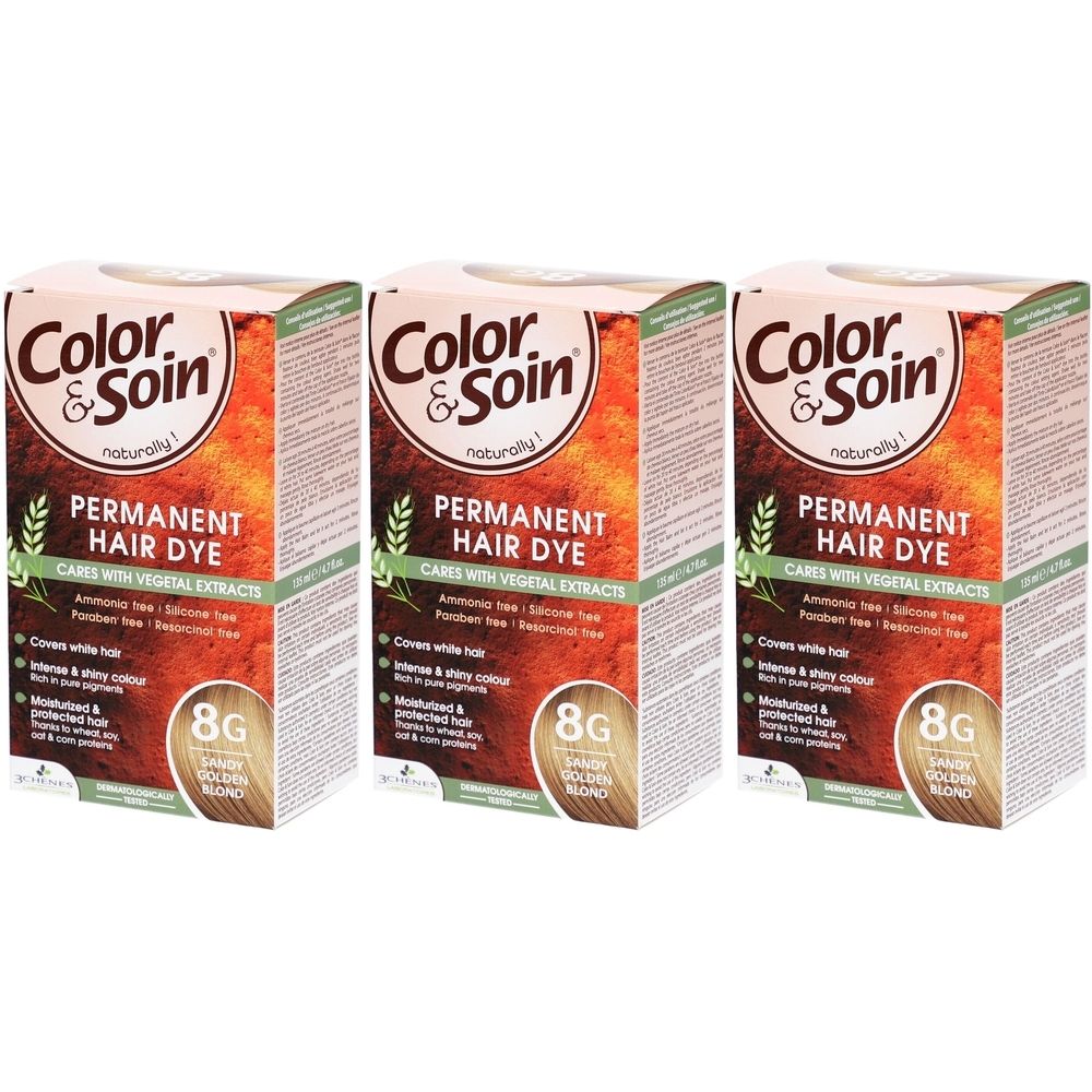 Drei Schachteln Color & Soin Permanent Hair Dye. Aufschrift: 8G, Sandy Golden Blond. Enthält pflanzliche Extrakte.