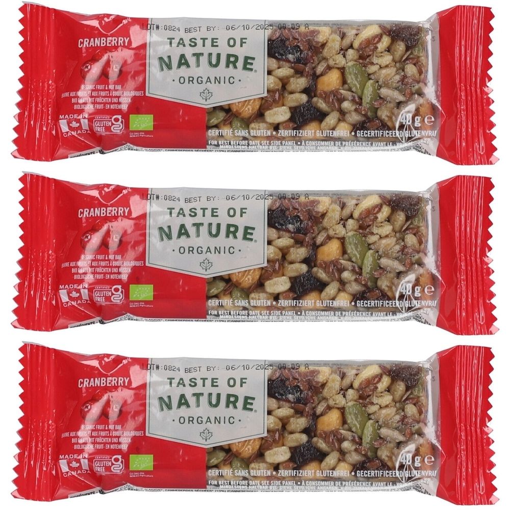 Drei verpackte Müsliriegel. Rote Verpackung mit Aufschrift "Cranberry" und "Taste of Nature Organic". Sichtbar sind Körner und Früchte.