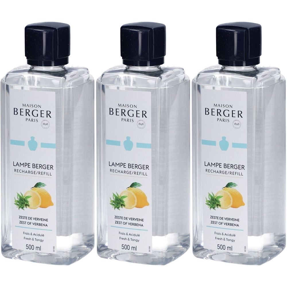 Drei Flakons Lampe Berger Nachfüllpack. Klare Flüssigkeit, schwarzer Deckel. Etikett mit Logo, Produktname und Inhaltsangabe.