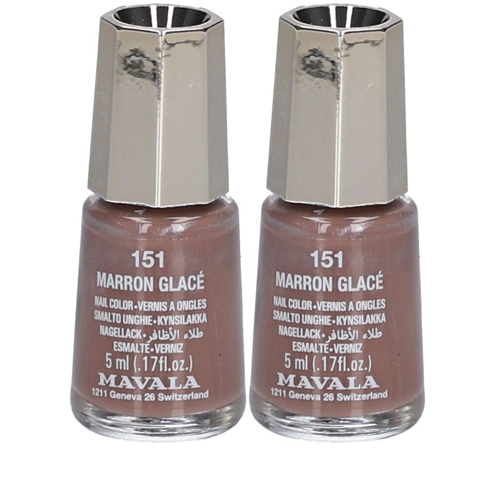 Zwei Flaschen Nagellack. Farbe: Marron Glacé. Aufschrift: 151, Mavala. Flaschen mit silberfarbenen Deckeln.