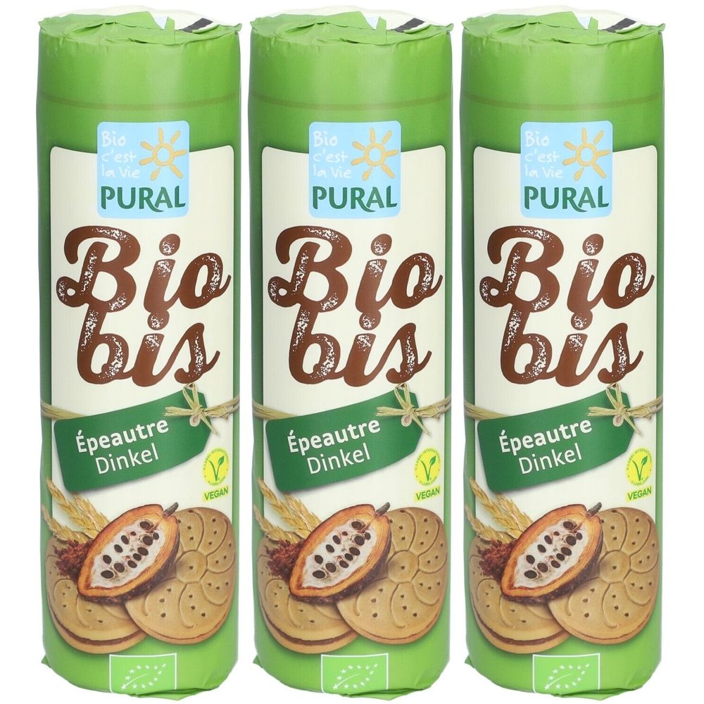 Trois emballages cylindriques avec l'inscription « Bio bis ». Inscription « Épeautre Dinkel » et « Vegan ». Illustration de biscuits et de fèves de cacao.