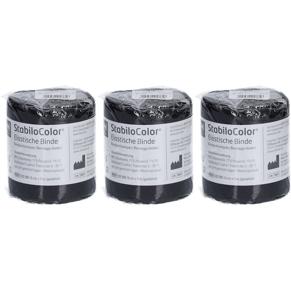 Trois rouleaux de bandage noir, emballés dans du film plastique. Inscription : StabiloColor, bandage élastique. Étiquette avec informations.